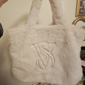 cream faux fur vs tote bag